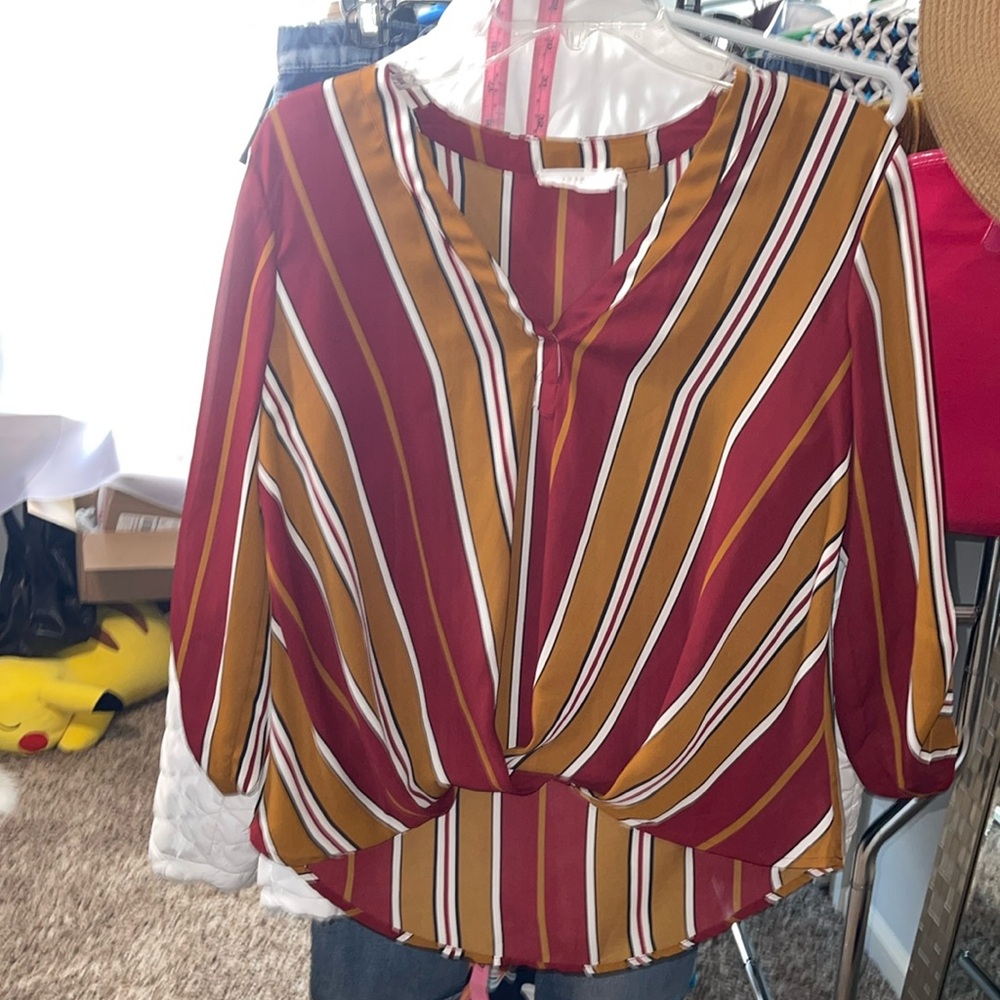 Lush pull over Size small but fits like a medium